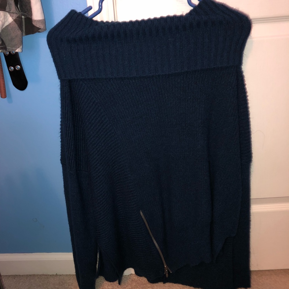 A blue sweater